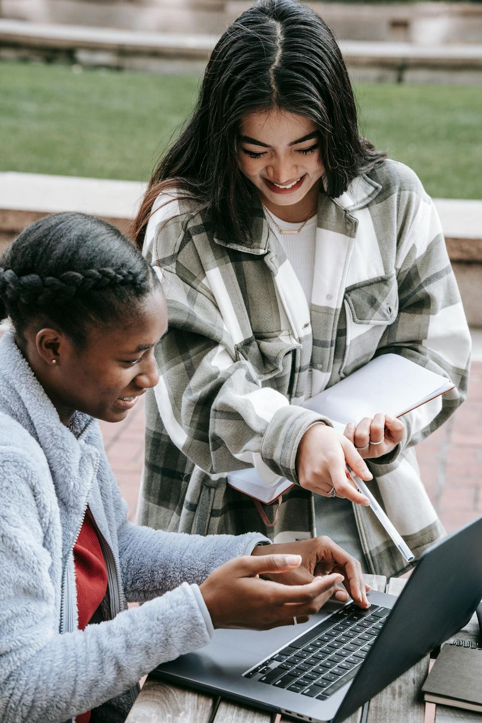 A participant working through a problem with a peer